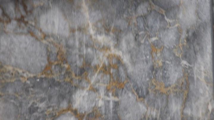 Dramatic gray and gold marble texture