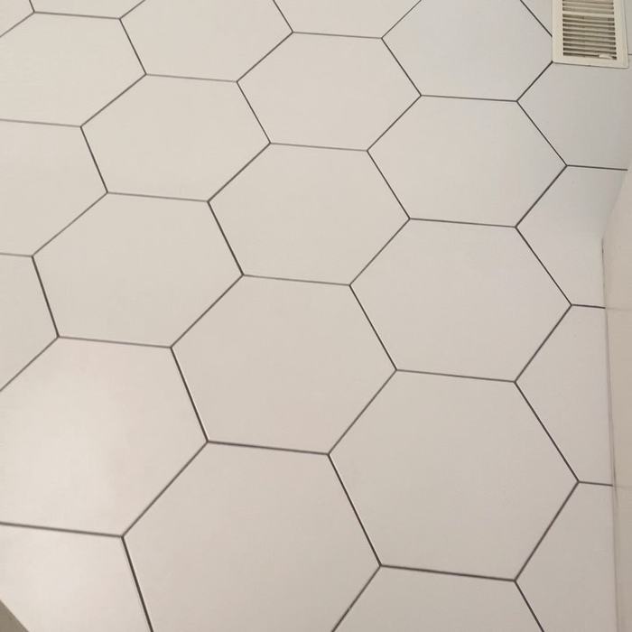 White hexagon tile floor