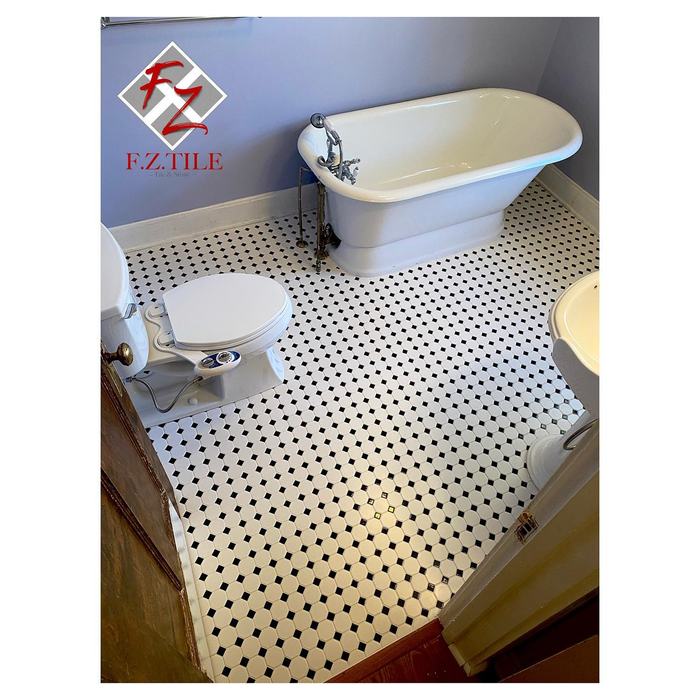 Clawfoot tub with basketweave floor
